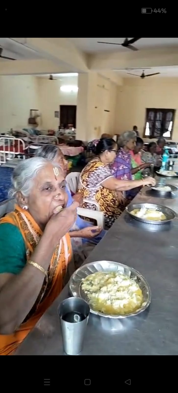 Elderly residents sharing a warm meal together at a care home supported by the trust